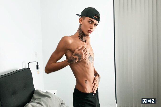 Tattooed twink Logan strips down to his jockstrap for a messy solo show