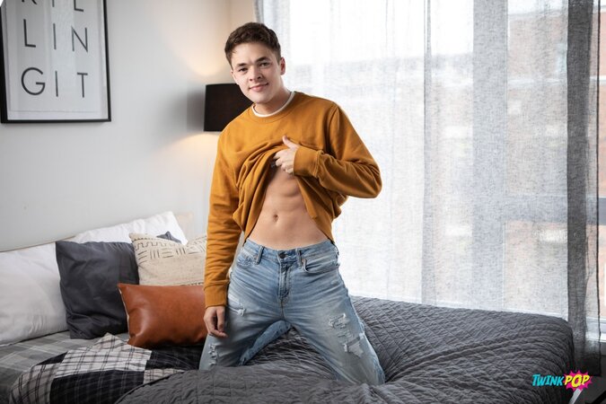 Troye Dean eases down on the massive cock of Leo Louis for a deep fuck