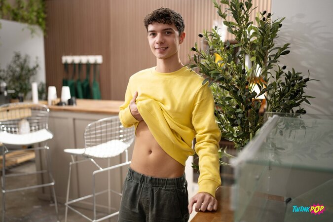 Barista Joey Mills serves up a extra creamy treat to customer Sam Ledger