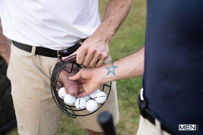 Dallas Steele shows Dick Dawson a different stiff shaft out on the golf course