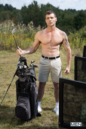 Dallas Steele shows Dick Dawson a different stiff shaft out on the golf course