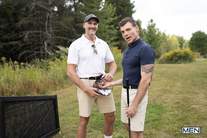 Dallas Steele shows Dick Dawson a different stiff shaft out on the golf course