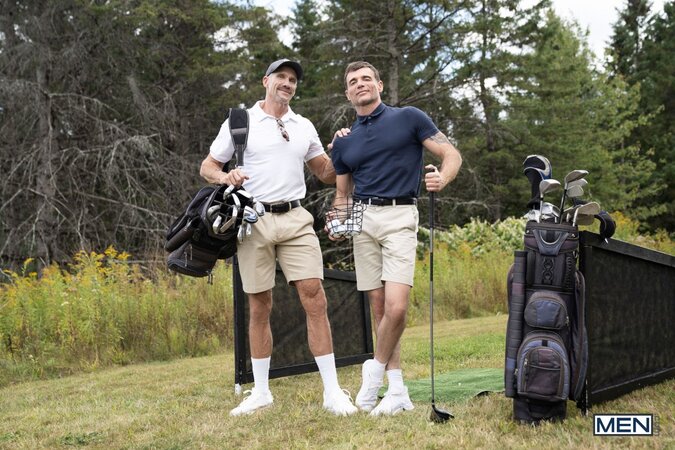 Dallas Steele shows Dick Dawson a different stiff shaft out on the golf course