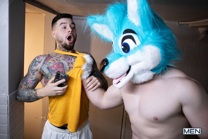 Marcus McNeill leaves his furry suit on to get sucked by Chad Dorado