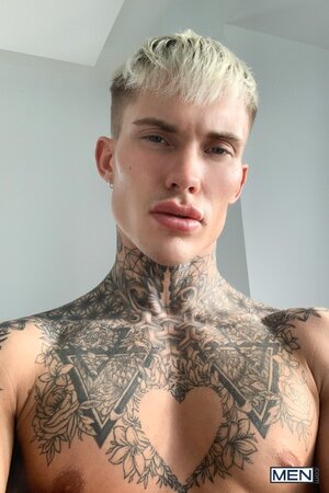 Tattooed jock Cole Clint teases his jockstrap in a hot solo show