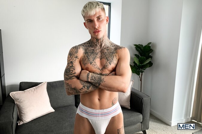 Tattooed jock Cole Clint teases his jockstrap in a hot solo show