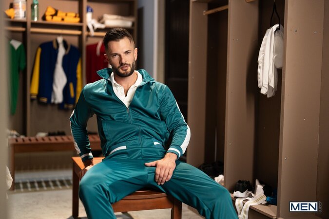 Coach Zac Barrett gives injured athlete Drake Von a wild locker room session