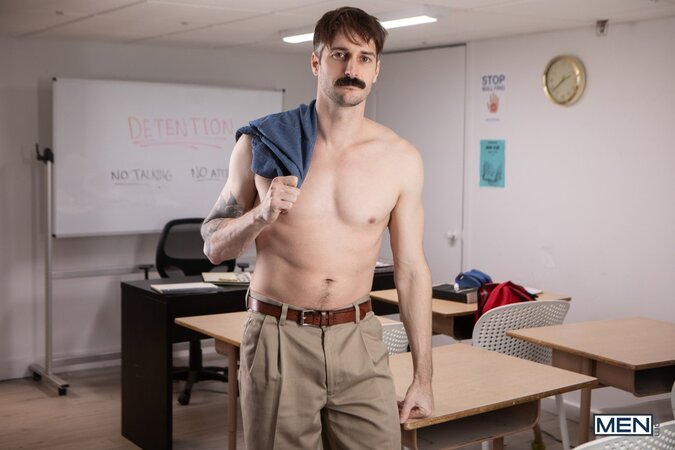 Rebellious student Ezra Mahomes draws on a desk and gets fucked by teacher Seb Leblan