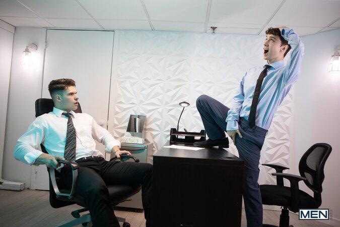 Malik Delgaty catches applicant Sam Ledger with a toy and pounds him on the desk