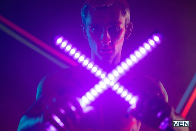 Theo Brady and Olivier Robert cover each other in neon paint during a rave fuck
