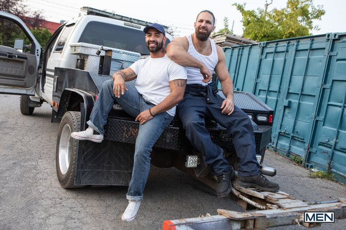 Mateo Zagal waits until Chuck Conrad is off duty before climbing into his lap