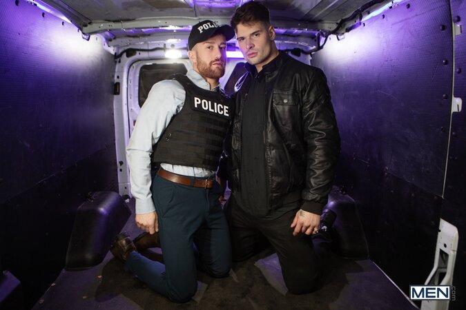 Malik Delgaty busts into the surveillance van to pound officer Olivier Robert