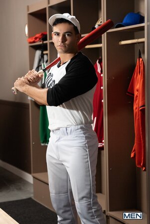 Coach Johnny Donovan gives player Damian Night a wild hands-on locker lesson