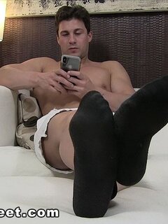 Aldo shows off his socks and sexy feet