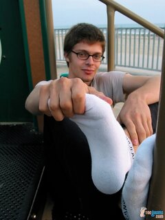 Taylor shows off his socks and feet