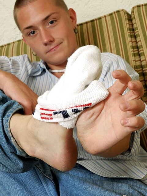 Seth Evans shows off his socks and feet