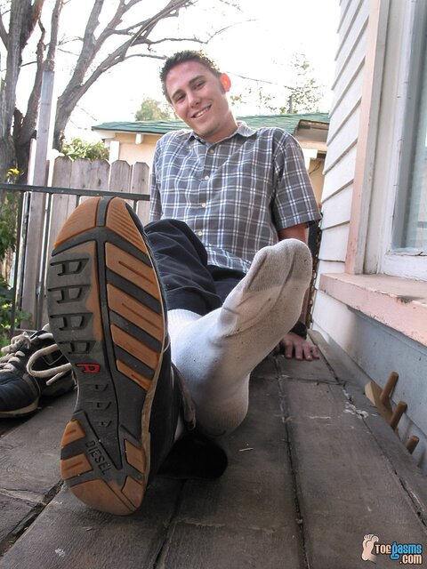Jason shows off his sneakers and socks