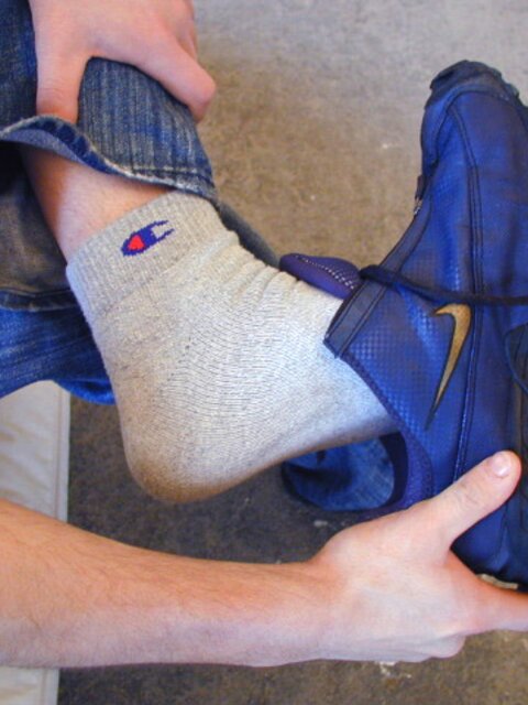 David teases with his smelly sport socks and playful feet