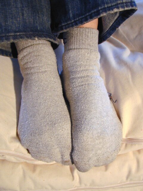 David teases with his smelly sport socks and playful feet