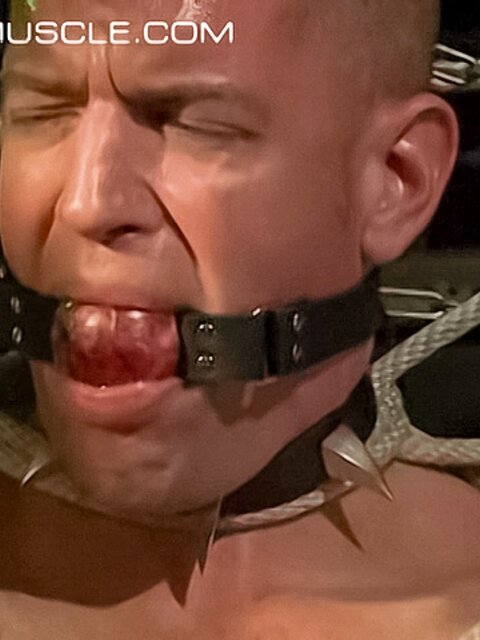 Bound Bigg Pete can't speak with a ball gag in his mouth