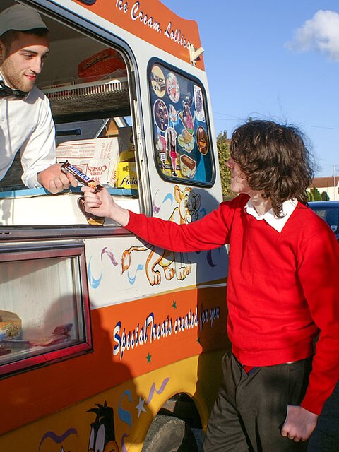 Jason Sutton and Bradley Hayden pound Aaron Aurora in the ice cream van