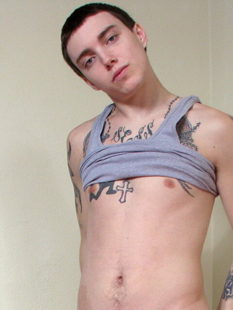 Tattooed twink Blinx teases fans with his cock