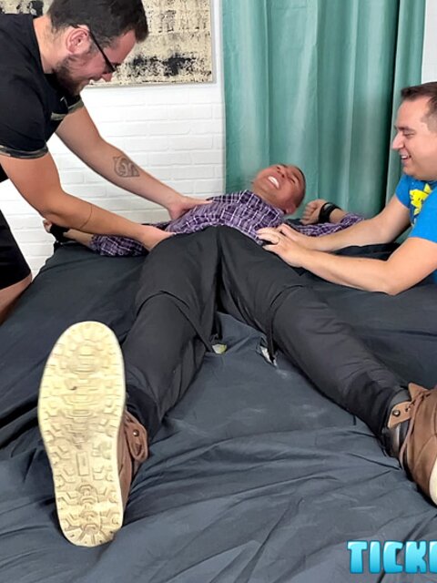 Threesome tickling session leaves Javier giggling and begging for mercy