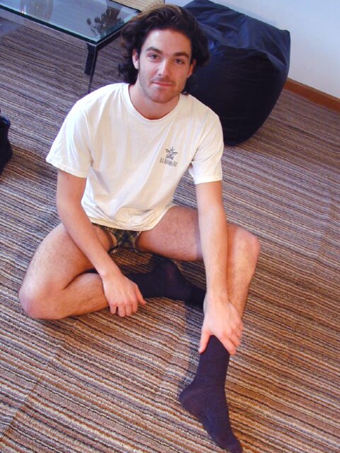 Bjorn from Sweden shows off his dark socks and sexy size 13 feet