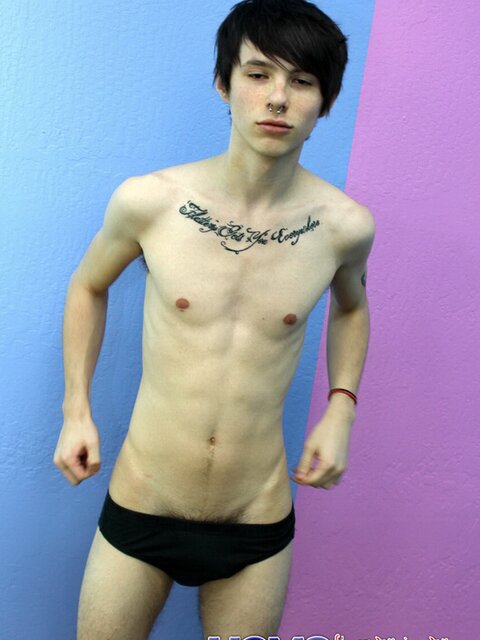 Emo twink strips and and shows tattoos on camera