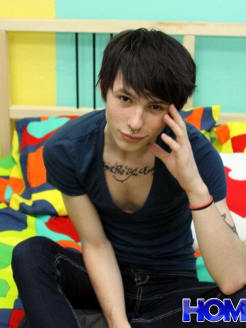 Emo twink strips and and shows tattoos on camera