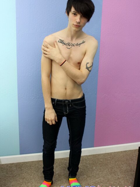 Emo twink strips and and shows tattoos on camera