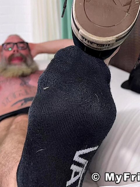 Rick S takes off his shirt and wiggles his toes for fun
