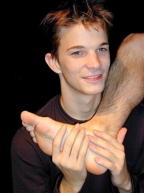 Twink Brandon models his feet but ends up getting them tickled instead