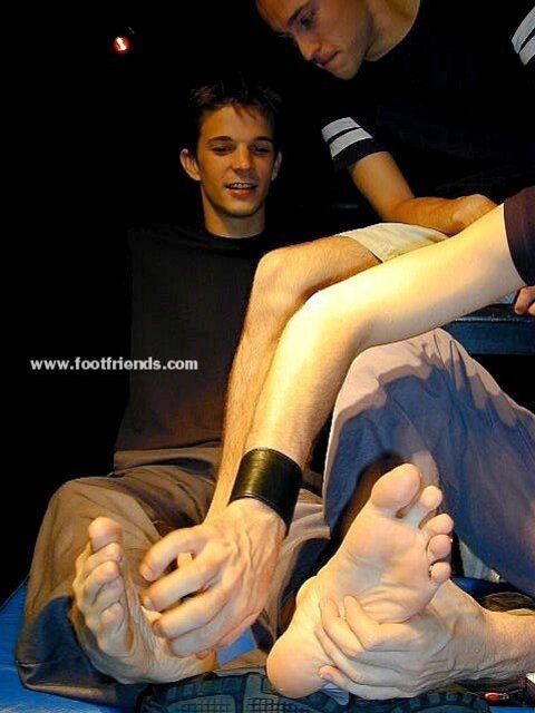 Twink Brandon models his feet but ends up getting them tickled instead