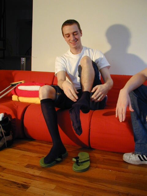 Aaron tries on various socks from the vault