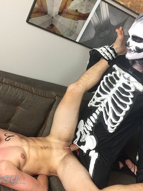 Zack Grayson big cock rips through his skeleton costume for Luke Hudson