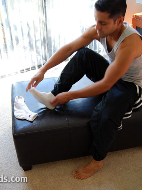 Petite hunk Andre poses solo in his favorite athletic socks for the fans