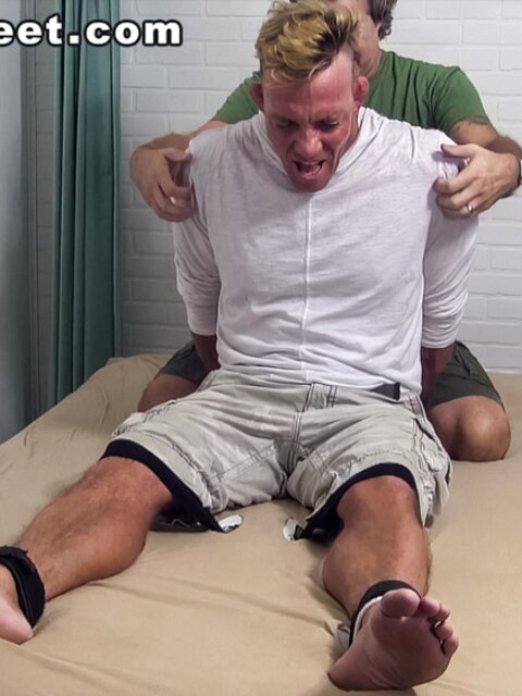Tristan screams with laughter as he's tickled in bondage