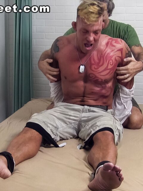 Tristan screams with laughter as he's tickled in bondage