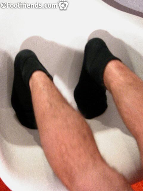 Damian Grey shows off his big dick and rippling abs in black ankle socks