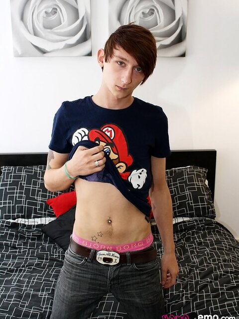 Cute emo boy Max Brown shows off his big uncut cock and jerks it hard