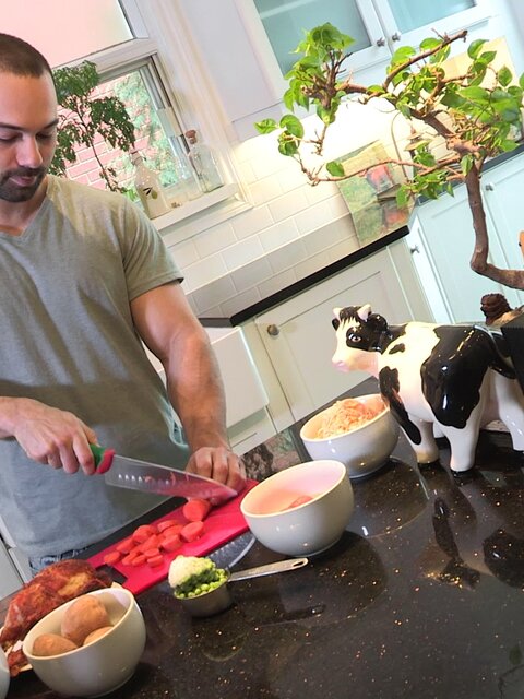 Alexandre strokes his cock while cooking