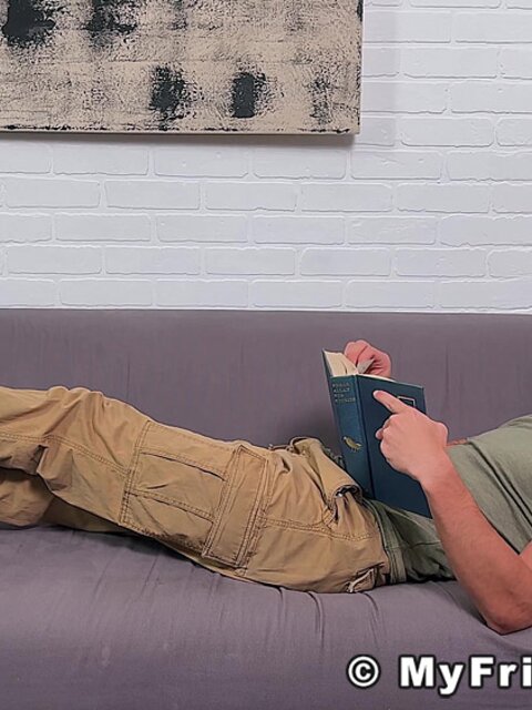 Zeke Stone props his size 10 feet while reading