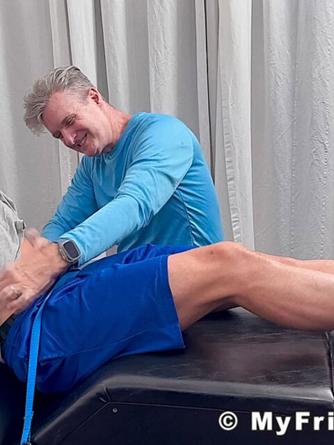 Dan Edwards tickles Travis Maverick’s feet and he laughs