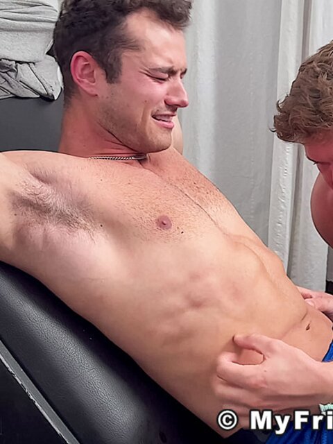 Dan Edwards tickles Travis Maverick’s feet and he laughs