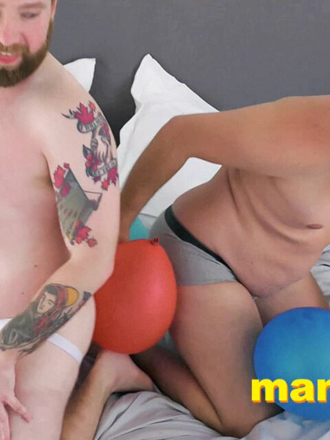 Leo Blue rubs balloons on Kaleb DeWulf’s belly