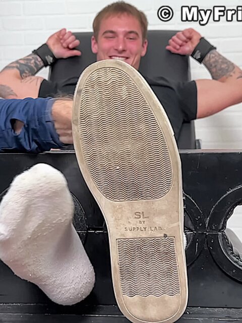 Tyler French giggles as Dan Edwards tickles his sides