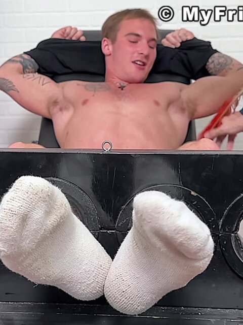 Tyler French giggles as Dan Edwards tickles his sides
