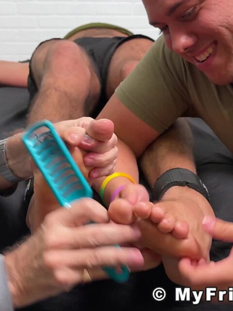 Dan Edwards and friend tickle Maui until he cracks