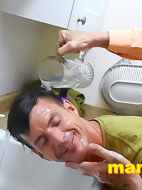 Richard Lennox washes Jeff Drizzle’s hair in kitchen